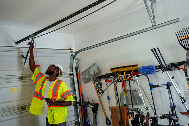 Professional Garage Door Panel Replacement technician working in Christian County County, IL